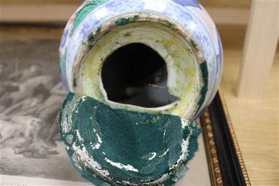 A Chinese wucai garlic-mouthed vase, late 17th century, restored, hole to base and an Isnik style baluster vase, possibly Kutahya (both